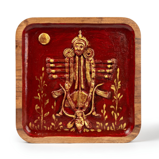 Handcrafted wooden wall hanging featuring an embossed golden Maa Durga motif on a glossy deep red finish.